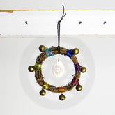 Small Wreath Bound with Rainbow-Colored Wire Sleigh Bells Carved Shell Eye and Sun Handmade | Woot & Hammy